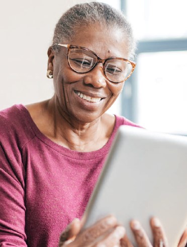 Older woman using tablet